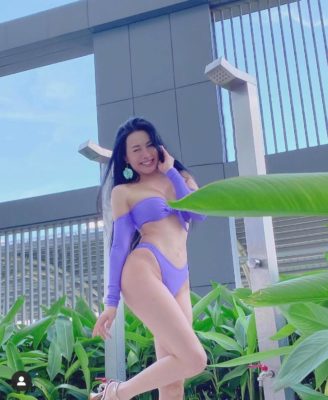 Yaya Trương Nhi lăng xê đồ bơi tím khoét hông - 2