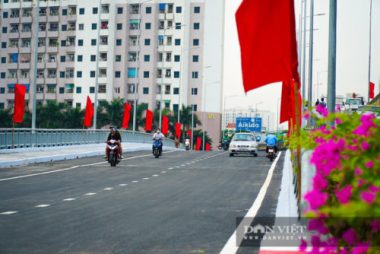 Tân chủ tịch Hà Nội cùng bộ trưởng Nguyễn Văn Thể dự lễ thông xe qua hồ Linh Đàm - Ảnh 8.